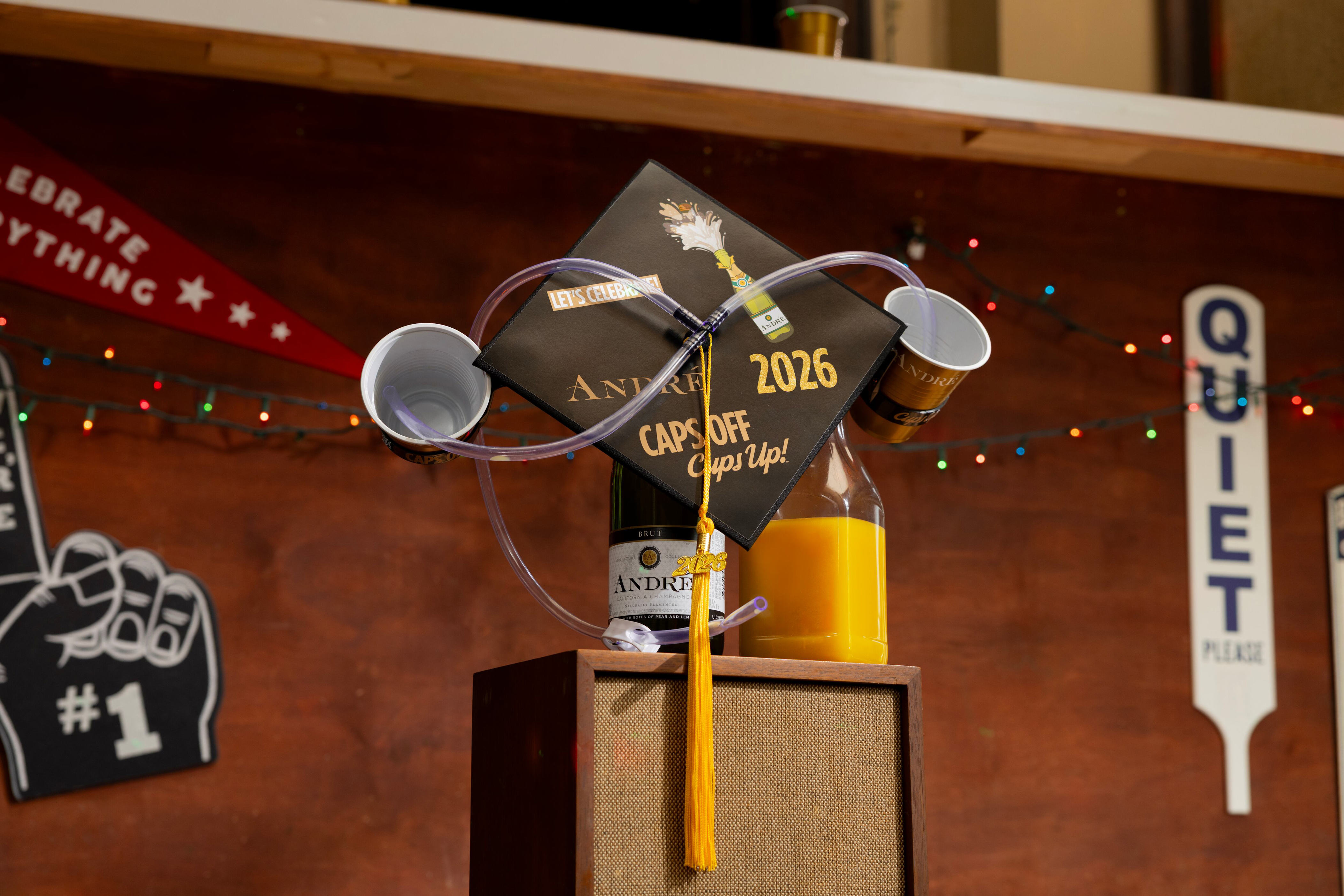 Champagne brand launches graduation cap that dispenses mimosas