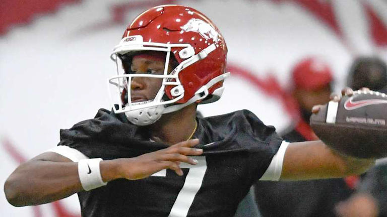 Razorbacks' OC likes quarterback numbers but history says pump brakes