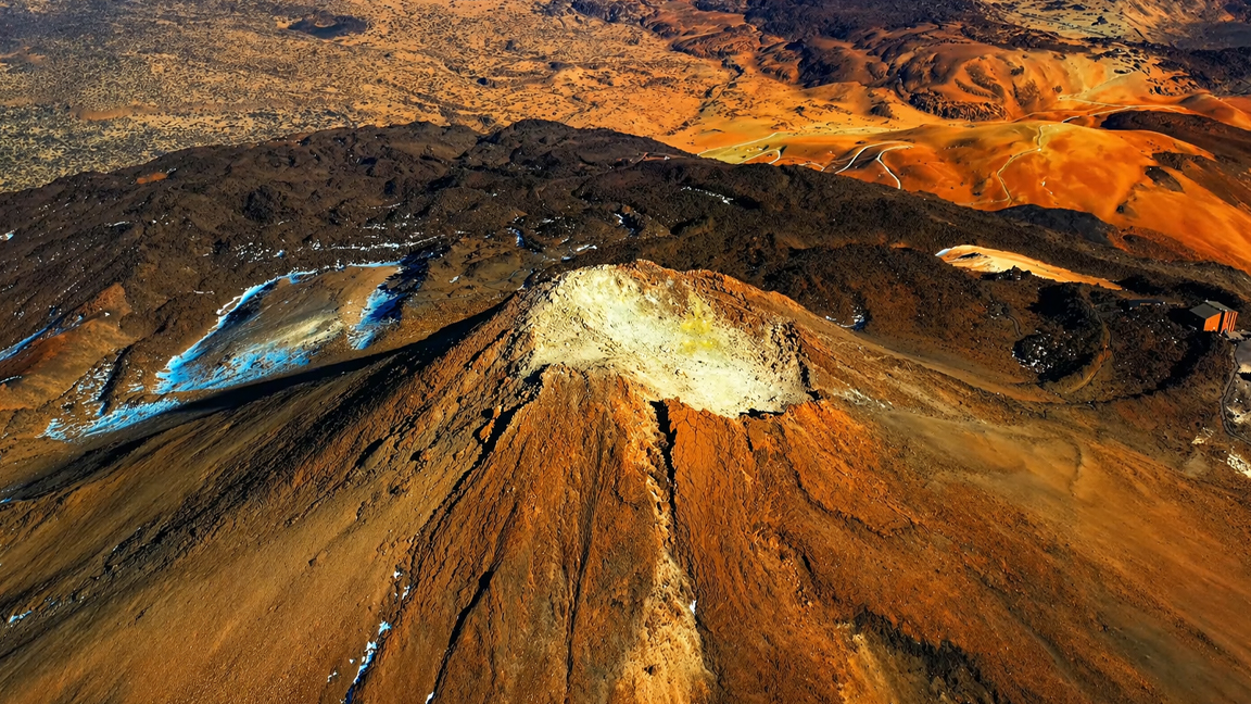 Majestic volcano crater surrounded by rugged terrain