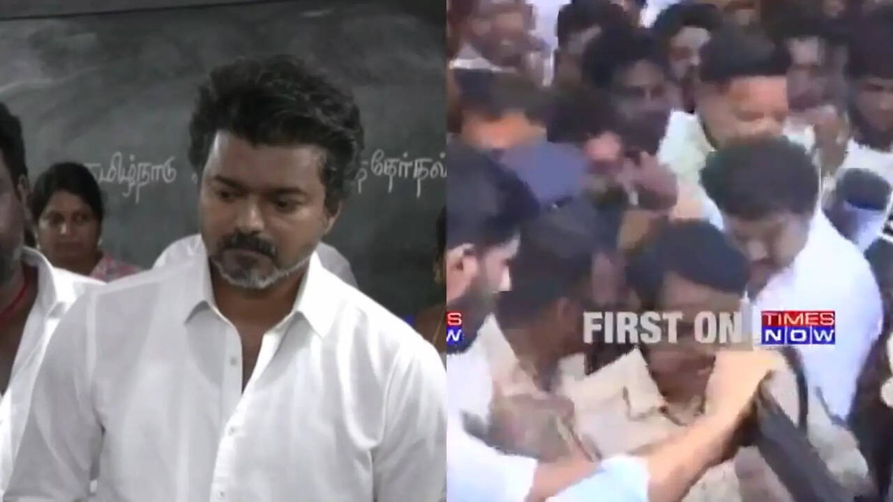 Thalapathy Vijay votes surrounded by a large crowd of supporters during ...