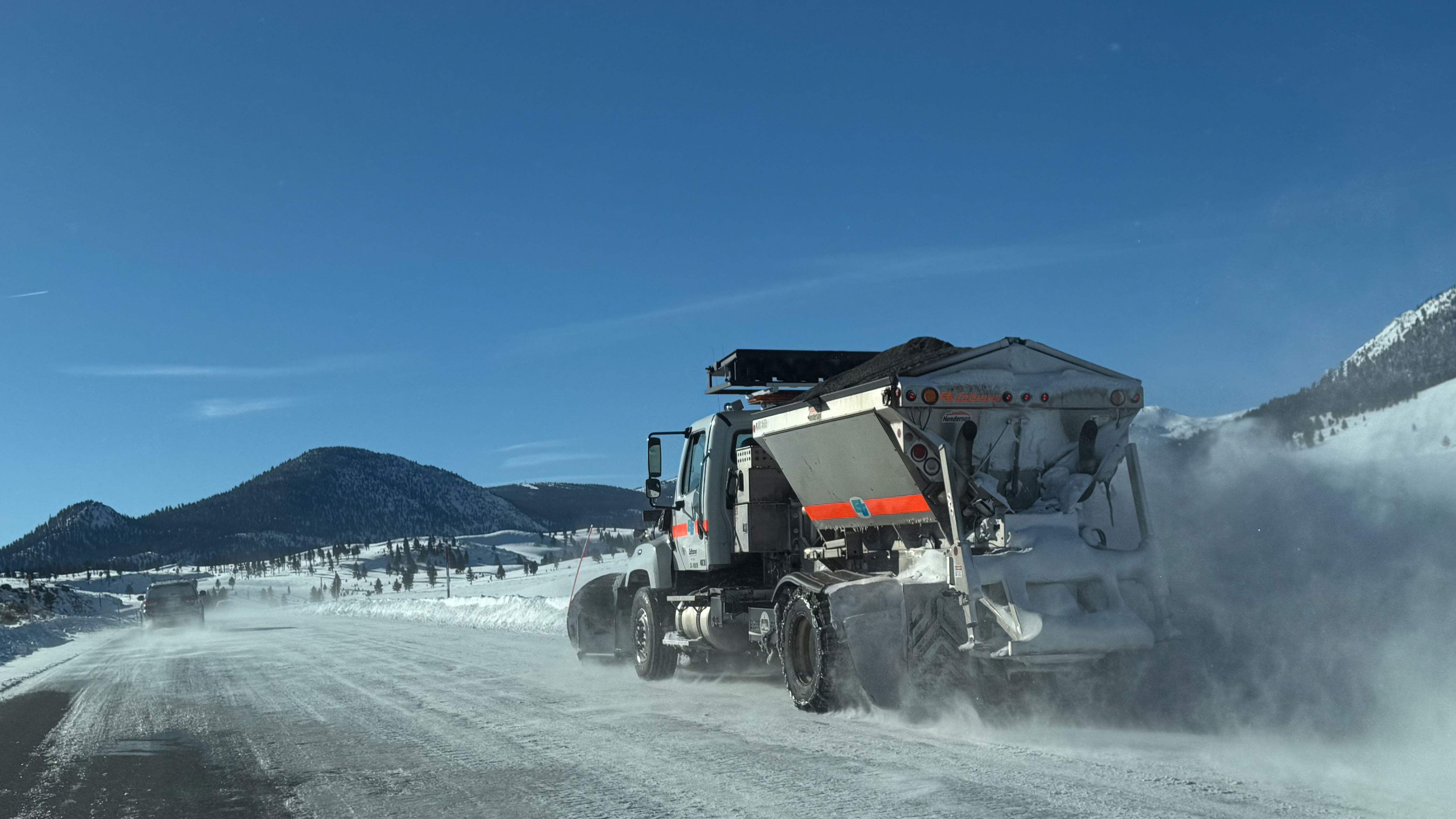 Caltrans Winter Maintenance Truck applying grit to road