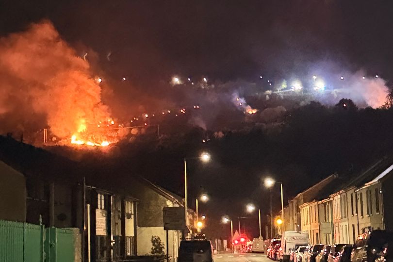 Homes evacuated after fire crews spend night battling fire near golf club