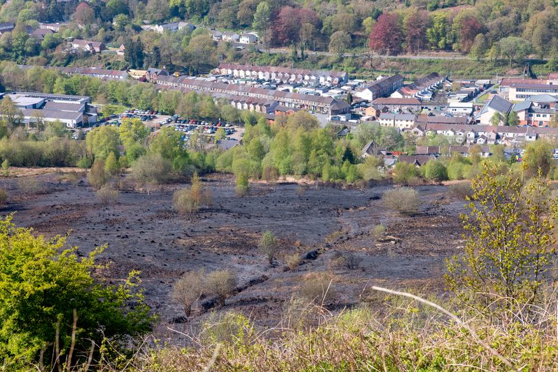 Devastating aftermath of massive fire can be seen for miles around