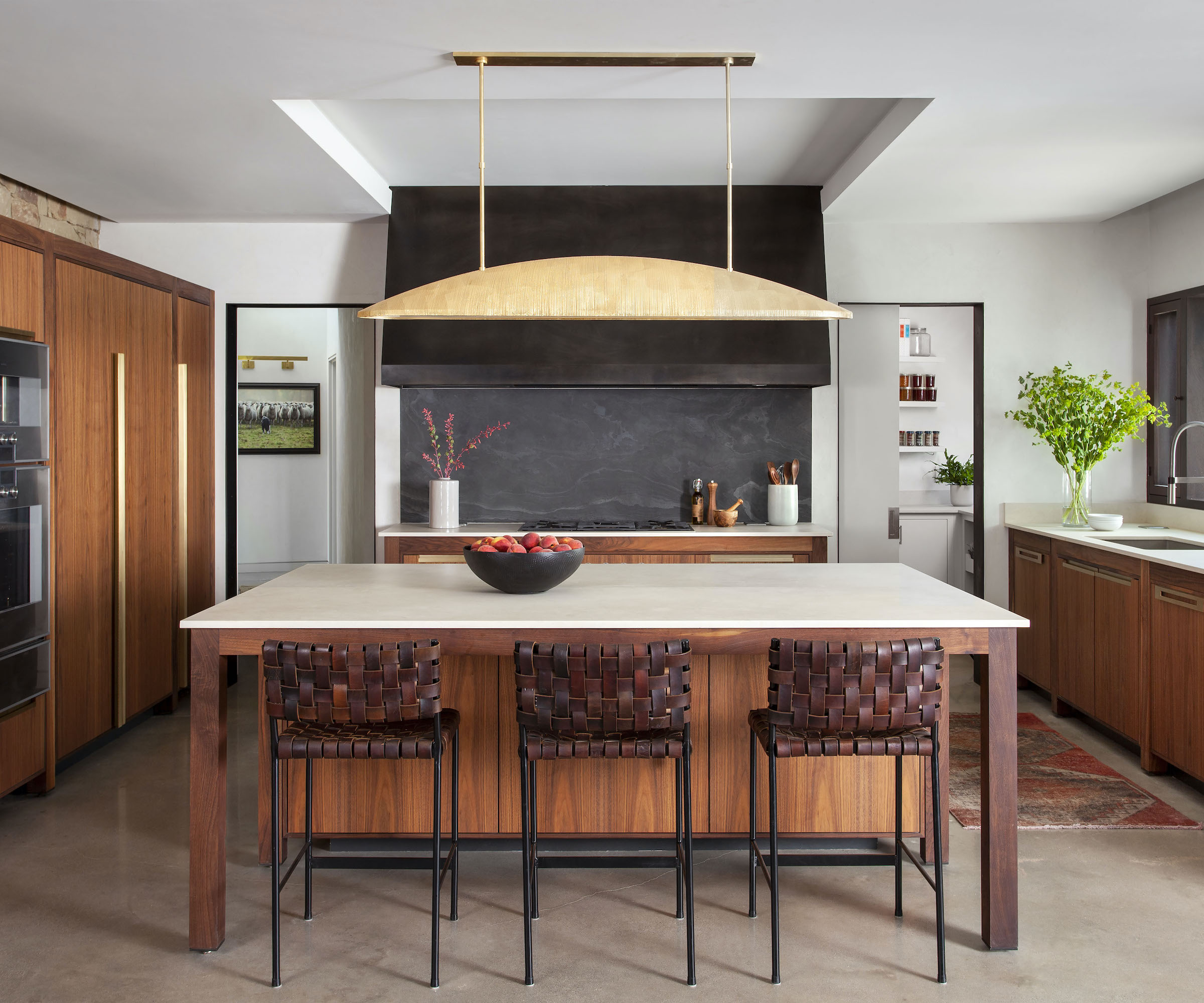 wood kitchen with island and breakfast bar