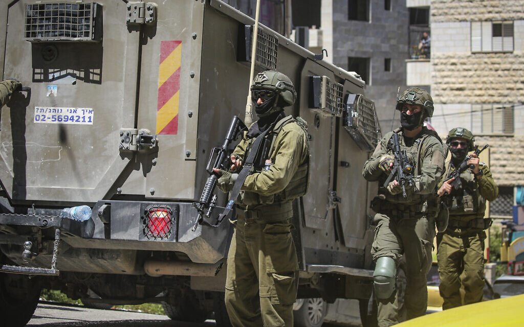 IDF says Palestinian teen killed earlier was hurling stones at troops ...