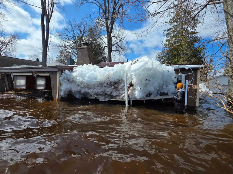 Ice and floodwater damage is seen at homes off Black Lake in Grant Township in Cheboygan County on Sunday, April 19, 2026.