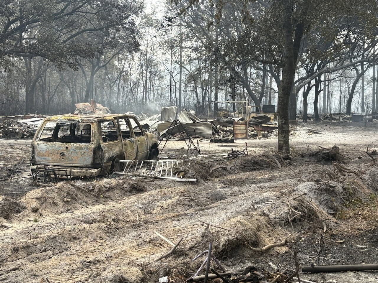 Southern US wildfires destroy homes, force evacuations