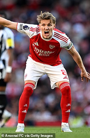 Paul Scholes believes Arsenal captain Martin Odegaard (pictured) is a major problem for them