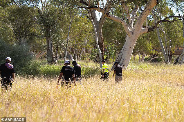 Searches are battling rough terrain and chest-high grass as they search for clues