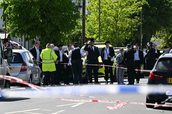 Man arrested on suspicion of attempted murder after 2 Jewish men ...