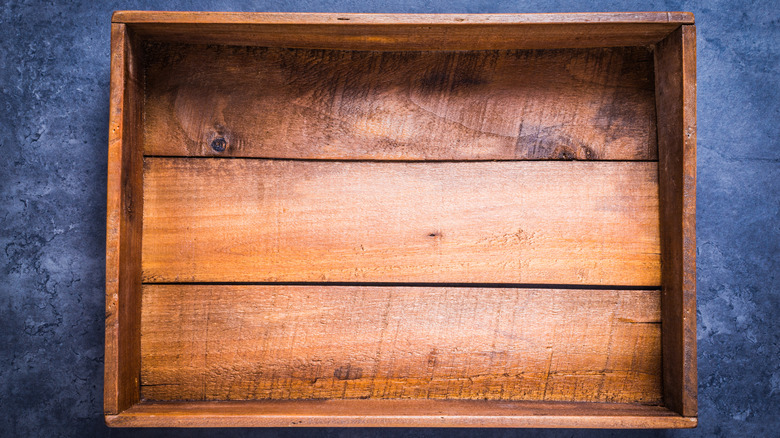 Turn a scrap wood lid into a useful storage tray for better organization