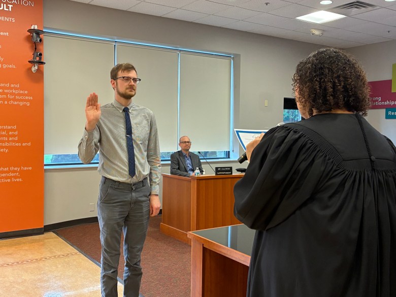 3 Racine Unified Board of Education members sworn in by Judge Jamie ...