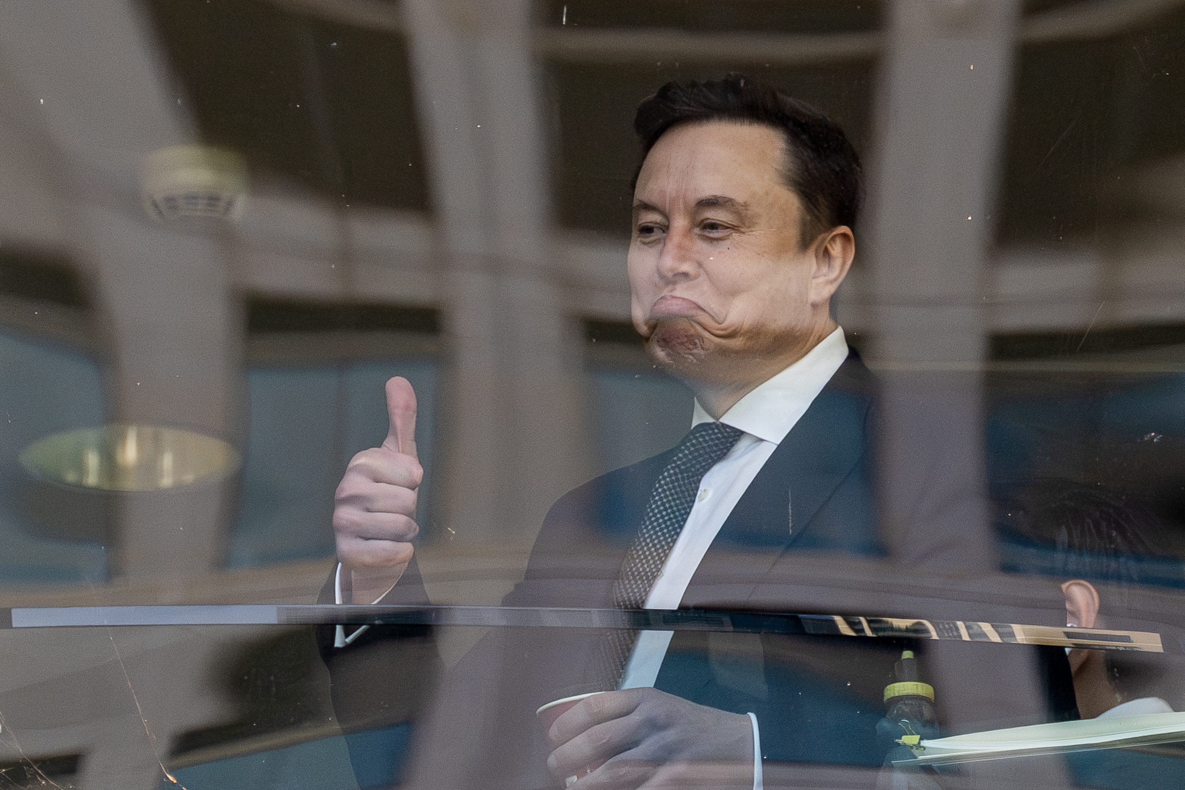 Elon Musk, chief executive officer of Tesla Inc., inside the federal court in Oakland, California, US, on Wednesday, April 29, 2026. Elon Musk is suing OpenAI and Microsoft Corp. over claims that the startup abandoned its founding mission when it took billions of dollars in backing from the software stalwart and planned its restructuring. Photographer: David Paul Morris/Bloomberg via Getty Images