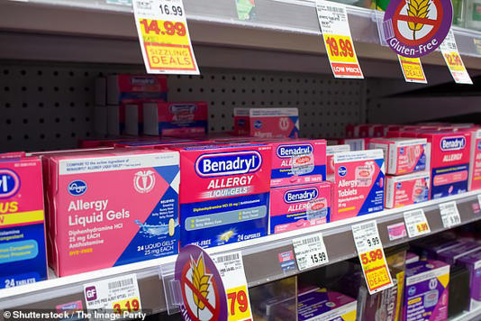 Benadryl, which contains the active ingredient diphenhydramine - an antihistamine - is used to temporarily relieve symptoms, such as a runny nose and sneezing (file photo)
