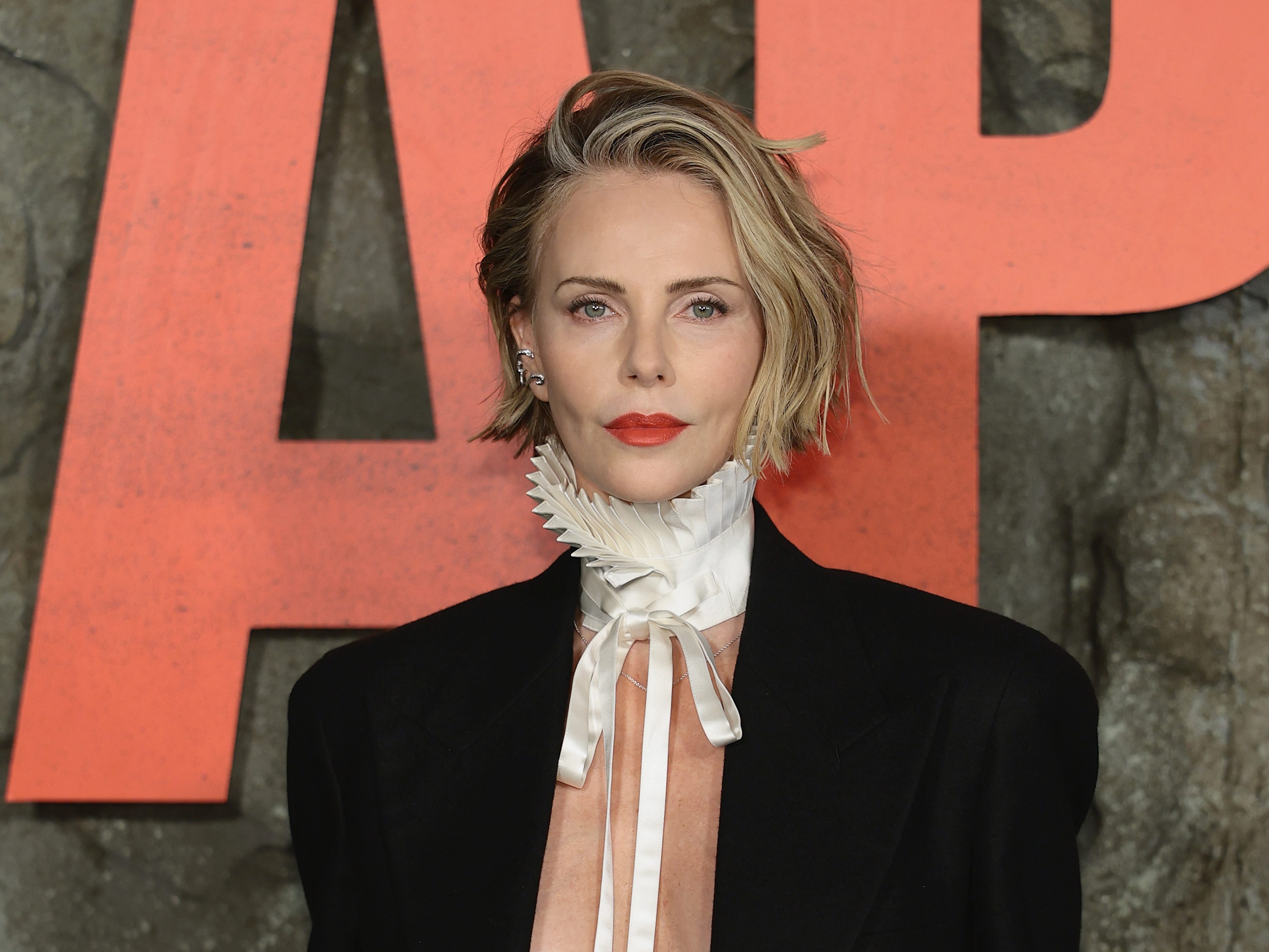 Charlize Theron, 50, says she doesn't see herself living with a partner again