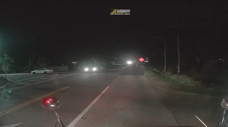 Dash cam video shows driver nearly hit child boarding school bus