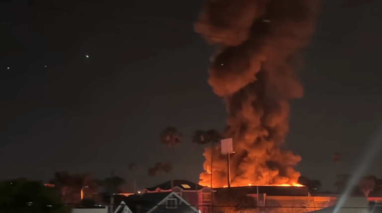 Plumes of smoke billow to the sky as crews battle structure fire in ...