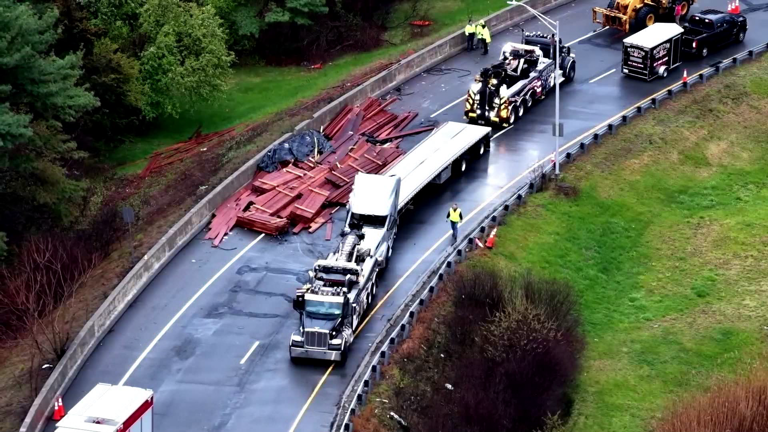 Tractor-trailer rollover on Mass Pike ramp slows commute in Weston