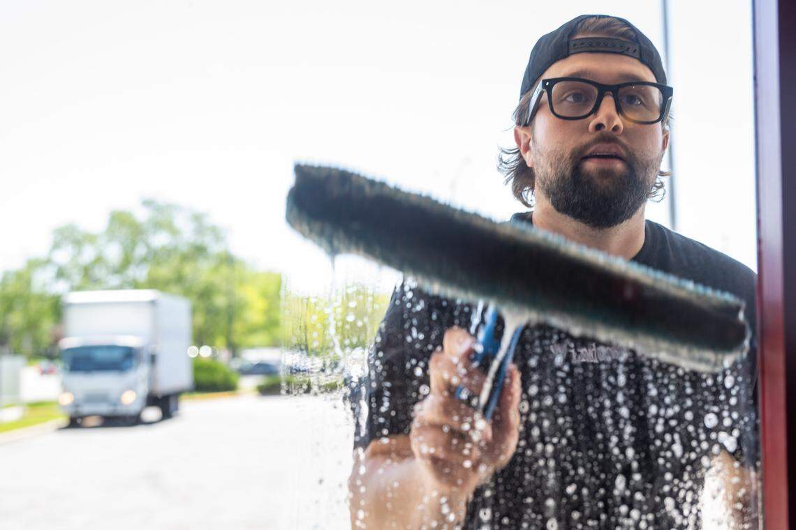 He's washing windows for free. Now it's bringing new life to KC restaurants