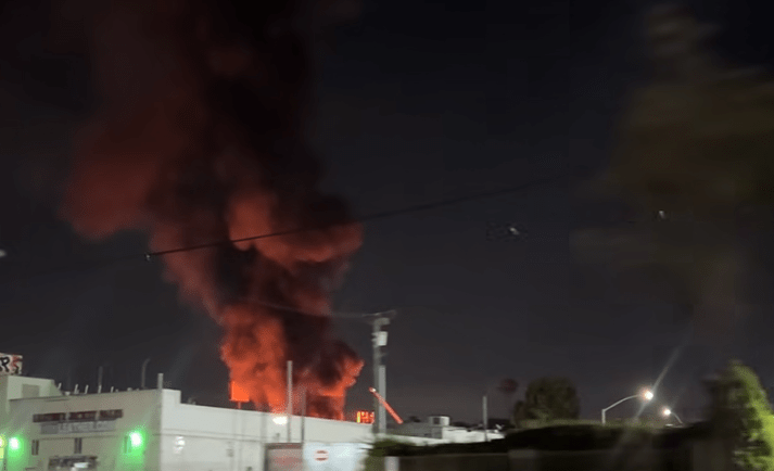 Plumes of smoke billow to the sky as crews battle structure fire in ...