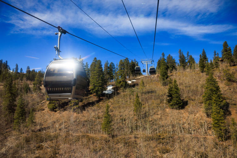 People ride the gondola at Breckenridge Ski Resort as temperatures reach into the 50s on March 18, 2026, in Breckenridge, Colorado. Some snow is set to hit Colorado this week, but the ski resort closed on April 19. (Photo by Michael Ciaglo/Getty Images)