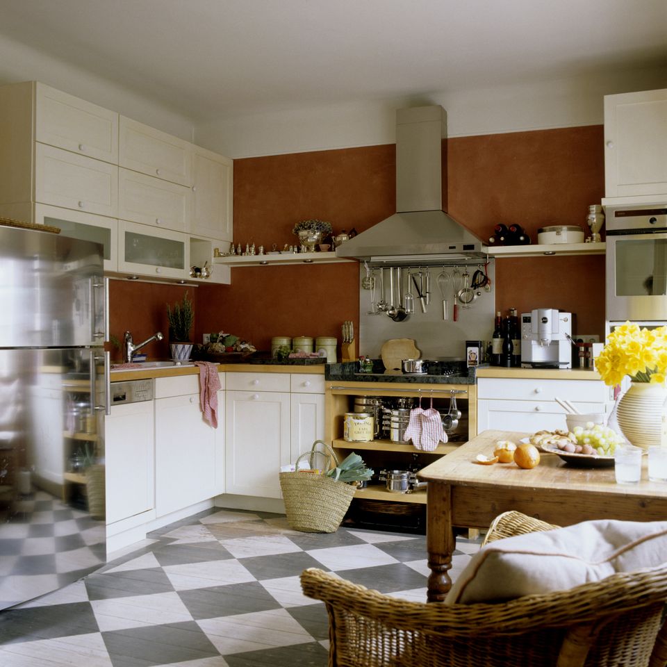 Kitchen with terracotta-colored wall.