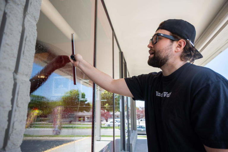 He's washing windows for free. Now it's bringing new life to KC restaurants