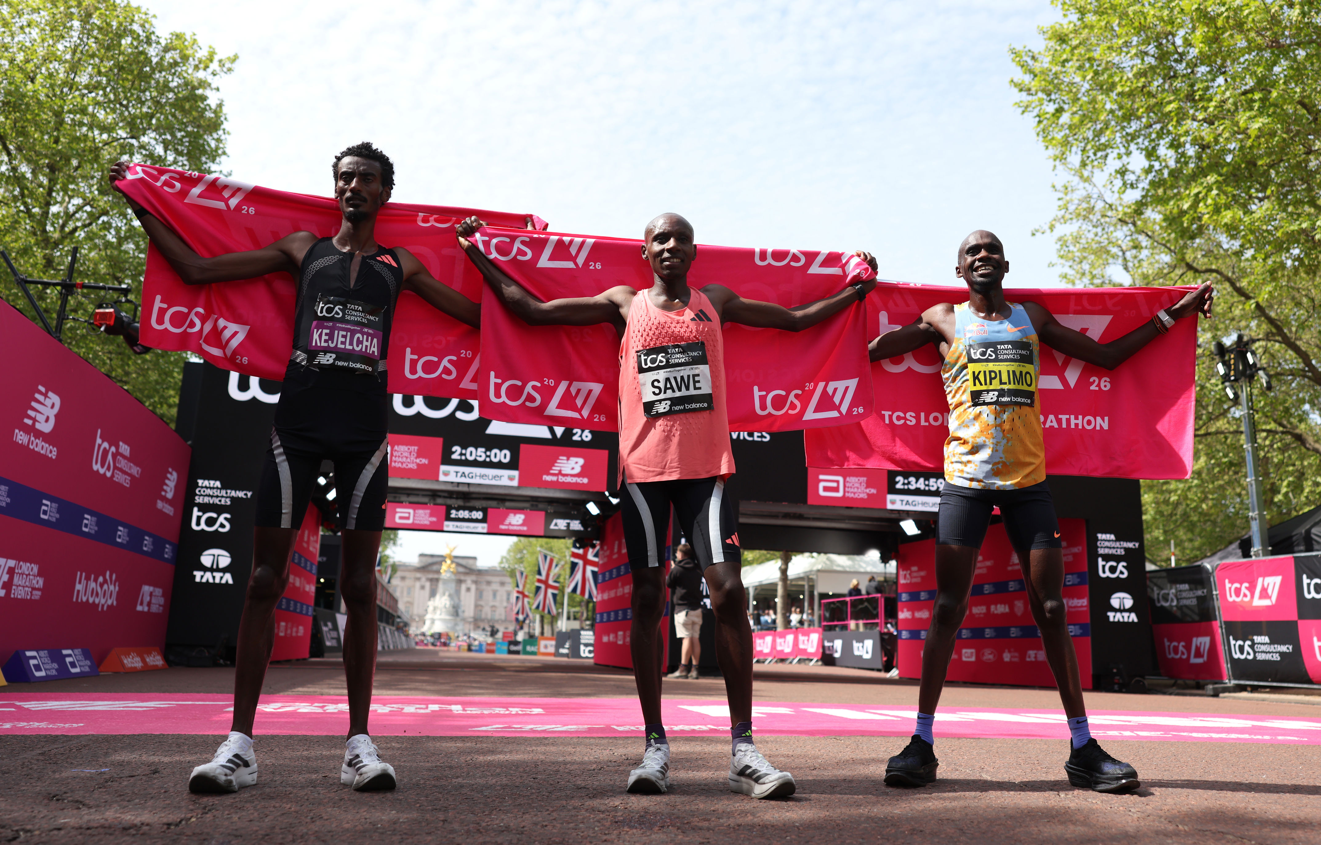 Two athletes smashed a marathon milestone, running 26.2 miles in under ...