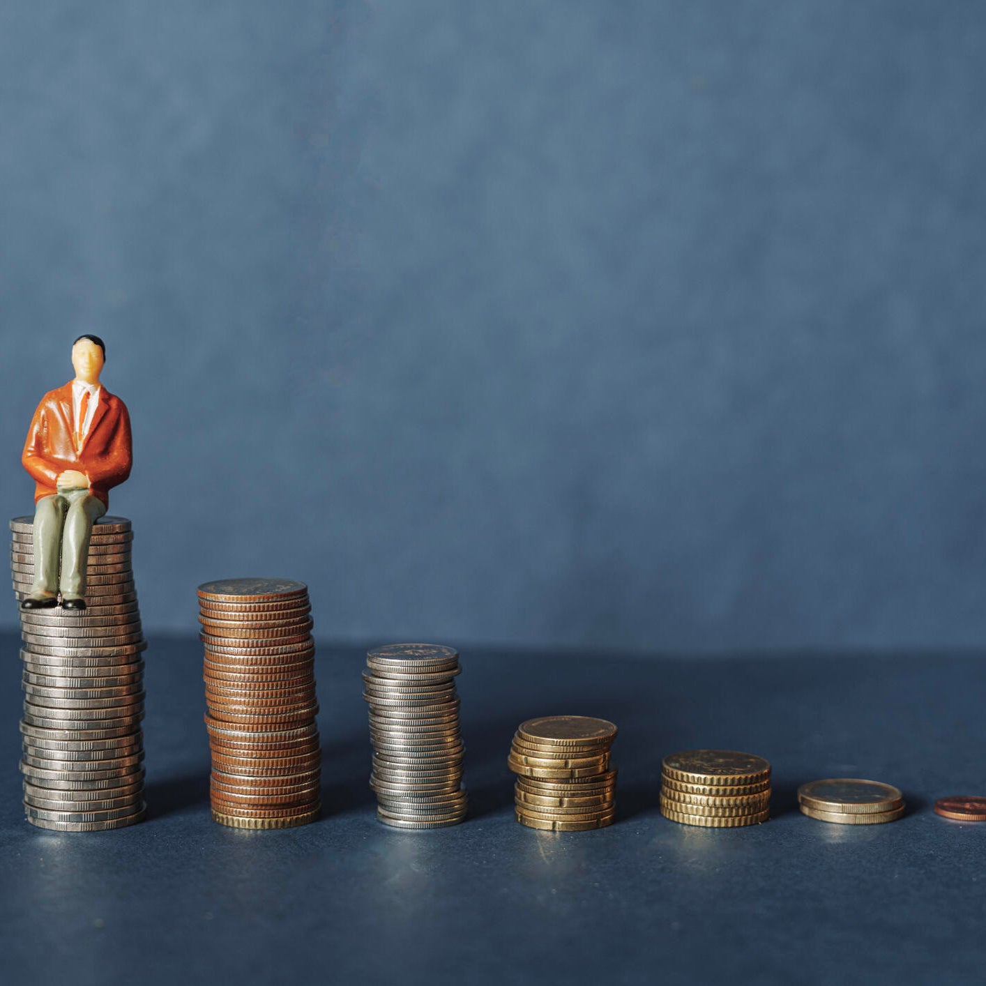Elderly people sitting on coin, Time counting down for retirement concept, social security income and pensions