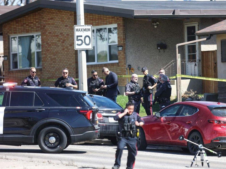 Two young children found dead in vehicle in northwest Calgary, man in ...