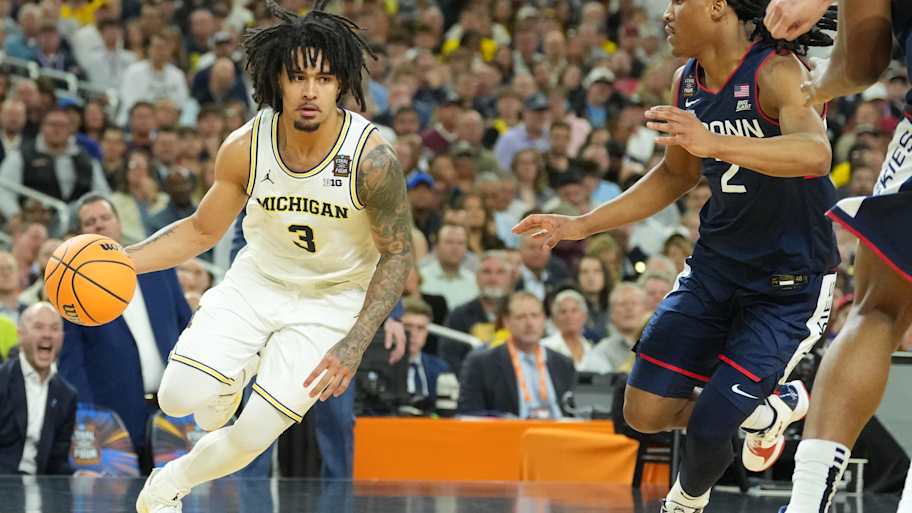 Michigan HC Dusty May explains Elliot Cadeau’s NBA decision, calls him ...