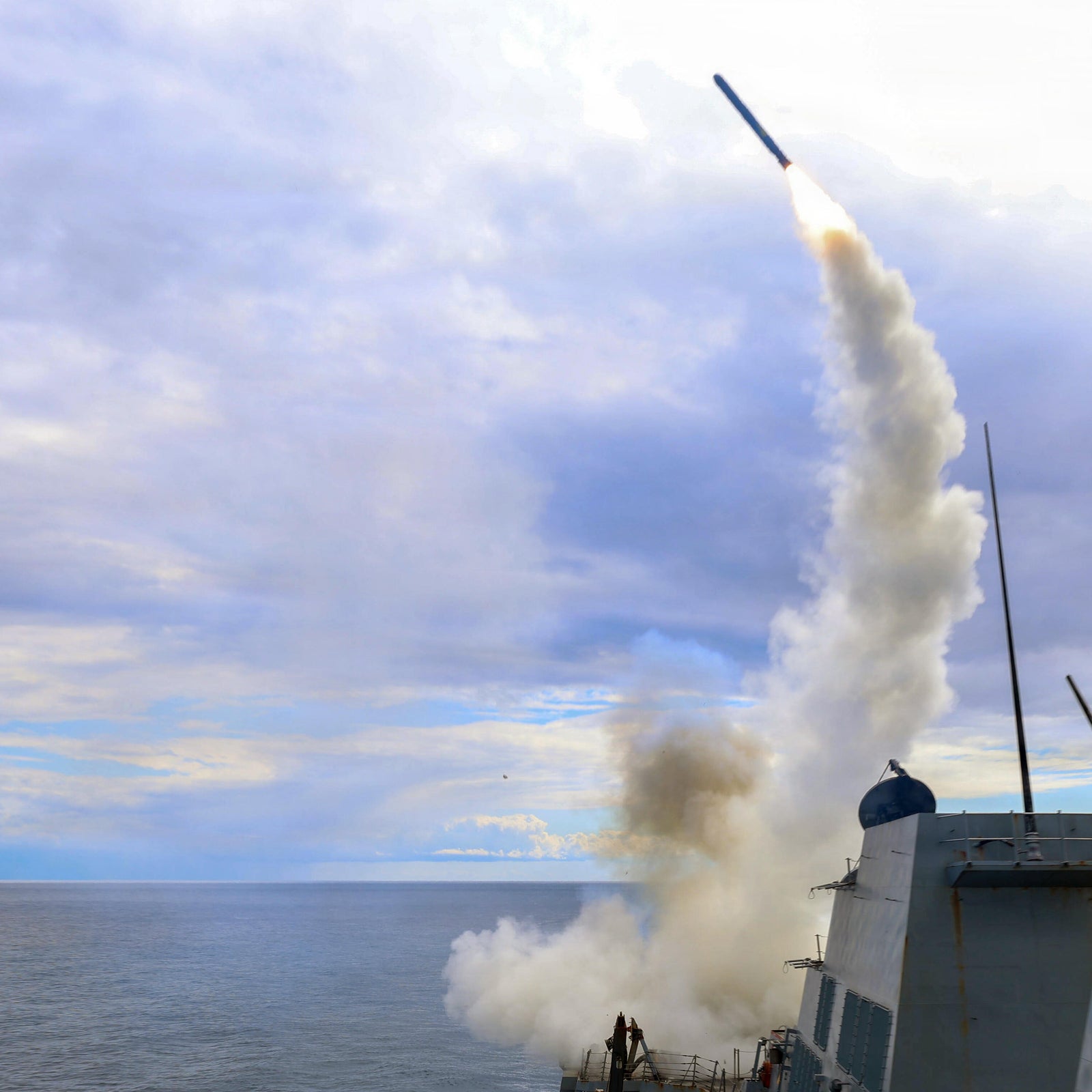 In this U.S. Navy released handout, Arleigh Burke-class guided-missile destroyer USS Thomas Hudner fires a Tomahawk land attack missile in support of Operation Epic Fury on March 1, 2026.