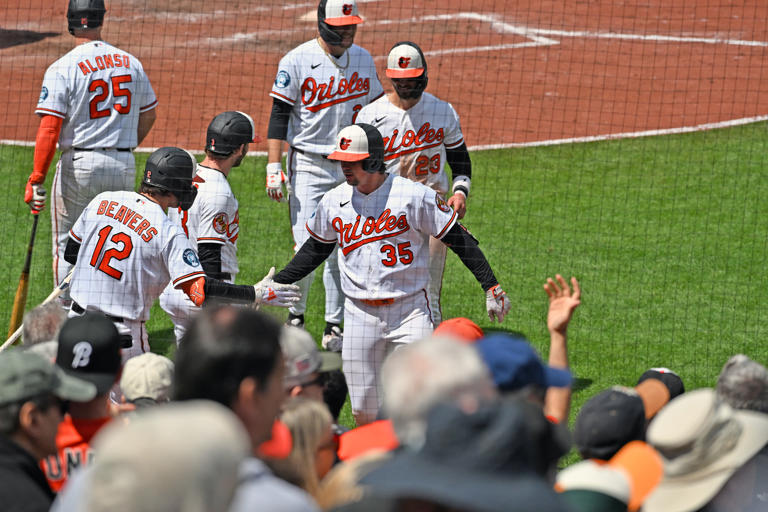 Orioles blast 2 grand slams in 10-3 win over Astros to open doubleheader