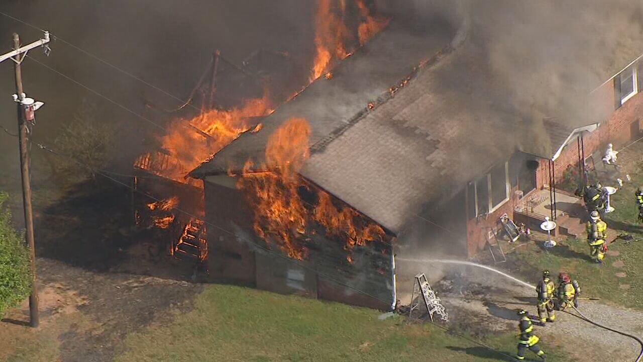 Crews tackle house fire in Rowan County