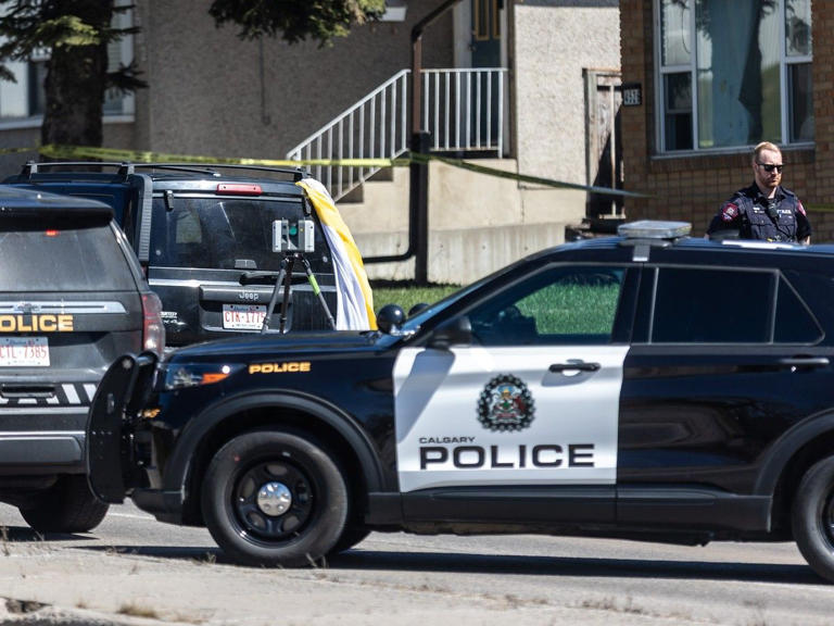 Two young children found dead in vehicle in northwest Calgary, man in ...
