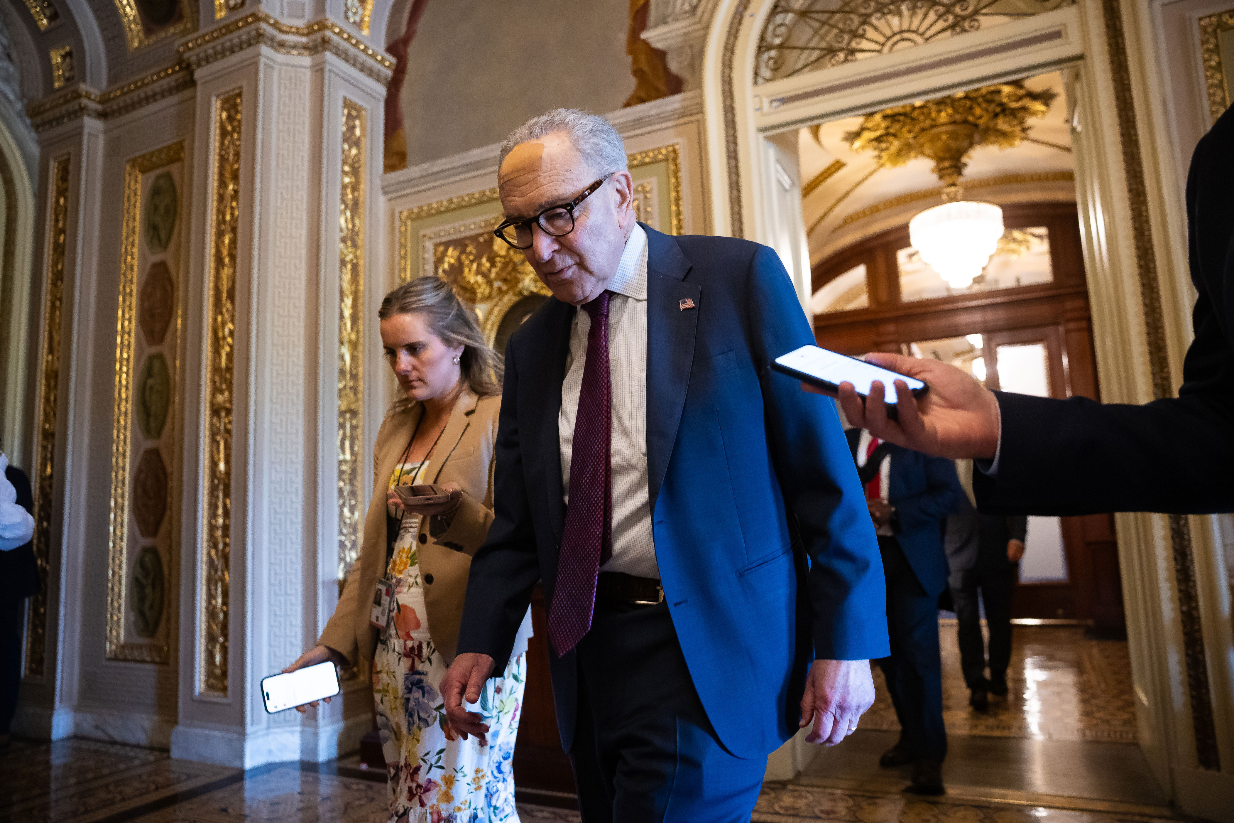 Senate Minority Leader Chuck Schumer (D-N.Y.) walks to a Senate Democratic Caucus luncheon at the U.S. Capitol on April 30, 2026.