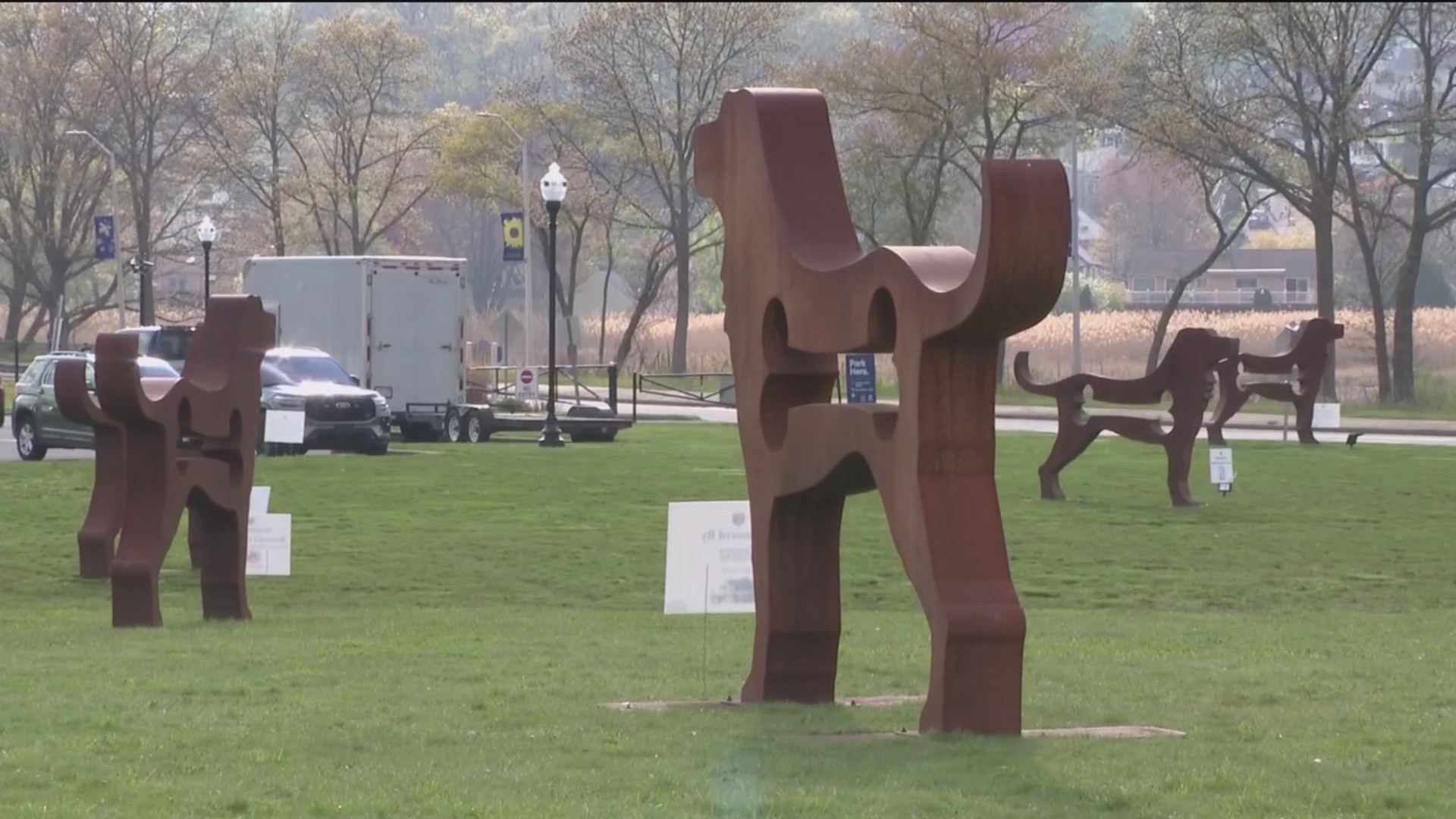 Dog sculptures towering over Savin Rock boardwalk in West Haven