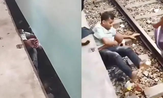 Viral: Father shields child on tracks as train passes overhead