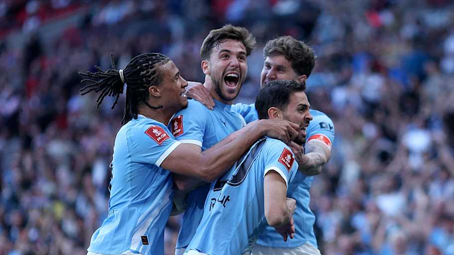 Man City return to Premier League action playing catch-up. | Neal Simpson/Sportsphoto/AllstarGetty Images.