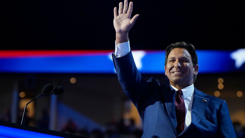 Florida Governor Ron DeSantis waves from the stage on Day 2 of the Republican National Convention at the Fiserv Forum in Milwaukee, Wisconsin, on July 16, 2024. - Elizabeth Frantz/Reuters