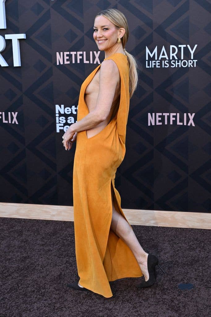 Kate Hudson turns heads in daring orange dress at Marty, Life is Short ...