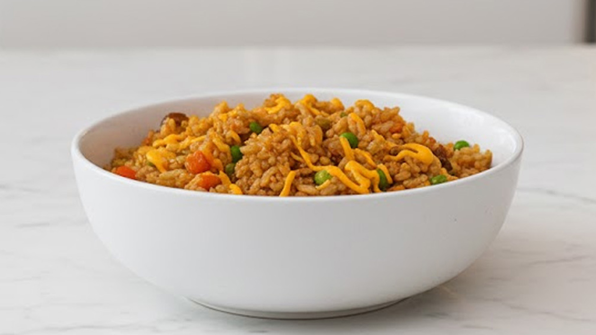How to make cheesy fried rice with vegetables