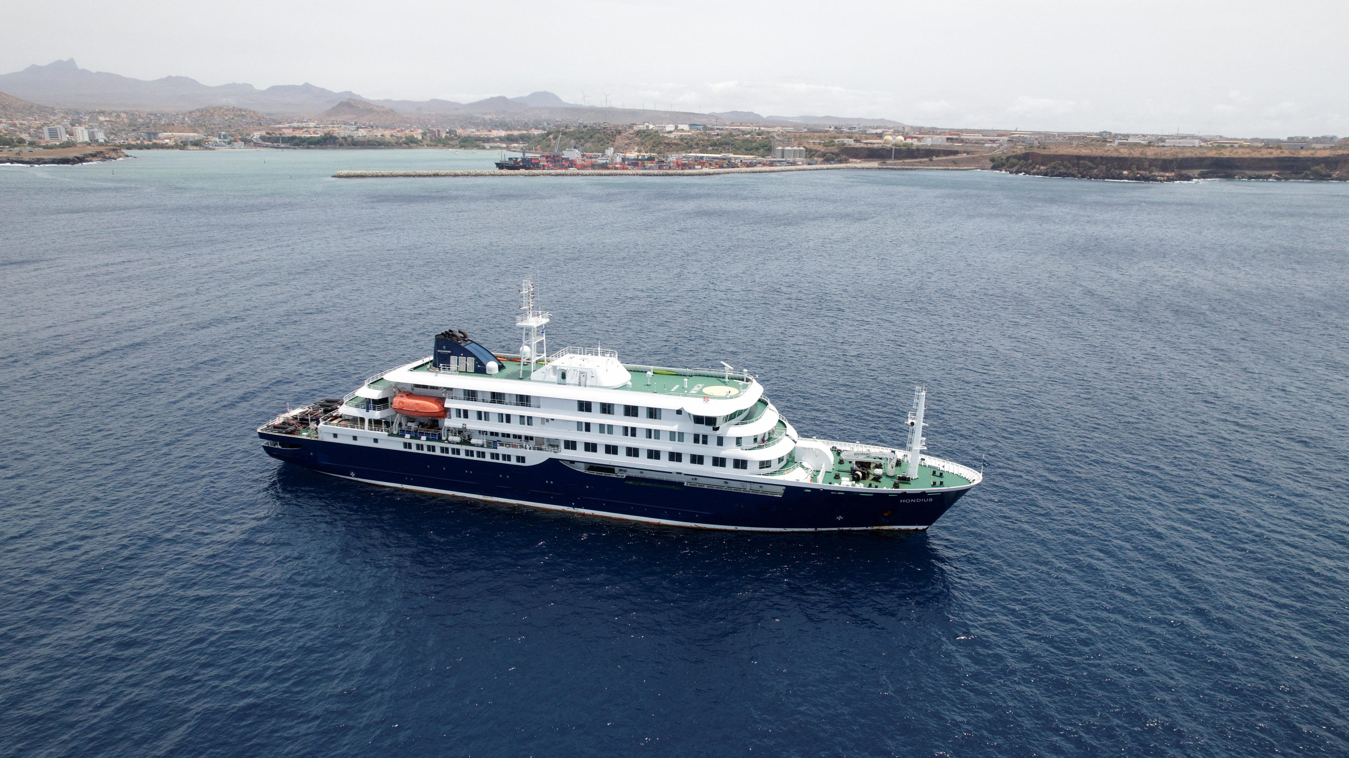 A drone view of the cruise ship MV Hondius, carrying passengers suspected of having cases of hantavirus on board, as it prepares to leave Praia, Cape Verde, May 6, 2026. REUTERS/Danilson Sequeira