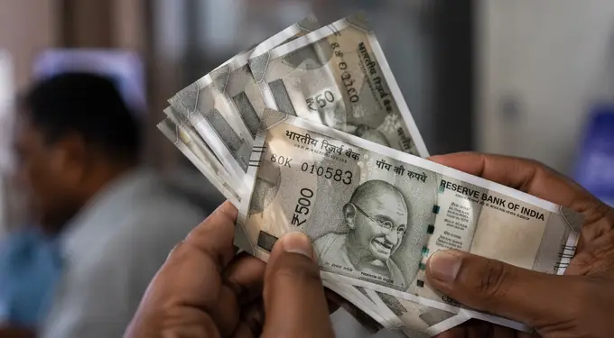 Indian rupee rebounds as oil prices slide on US-Iran deal hopes