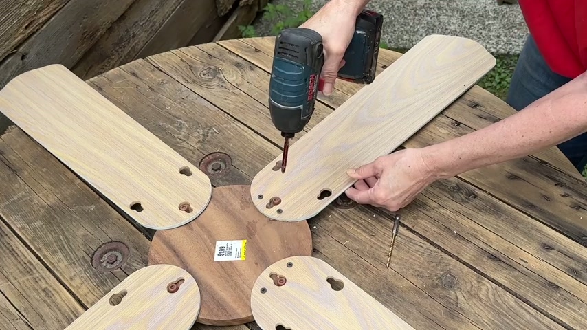 She turns old fan blades into a garden masterpiece!