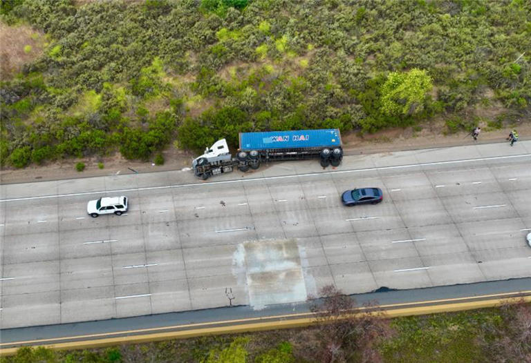 Overturned semi-truck snarls traffic on I-5 near Mission Bay