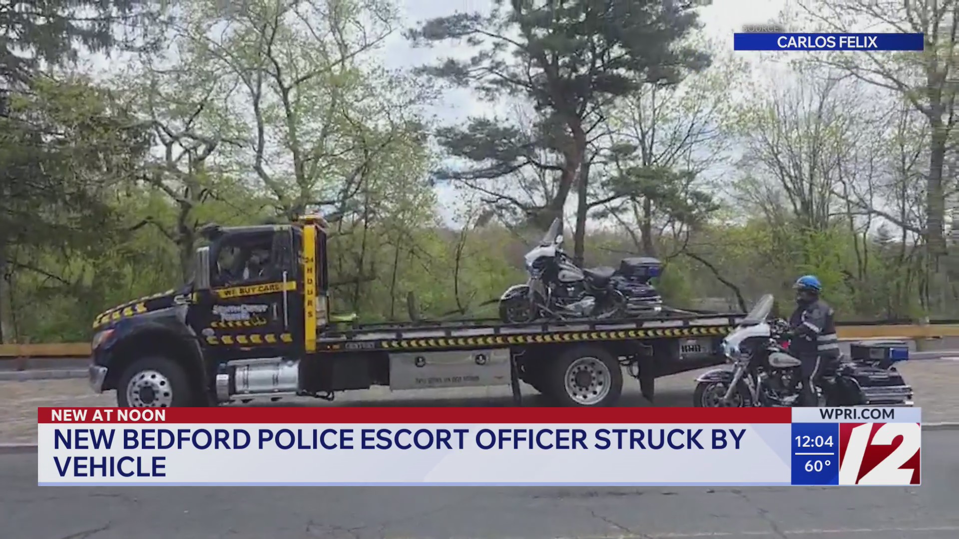 New Bedford officer struck by vehicle during police escort