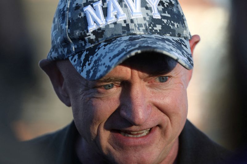 FILE PHOTO: Mark Kelly attends a campaign rally in Phoenix