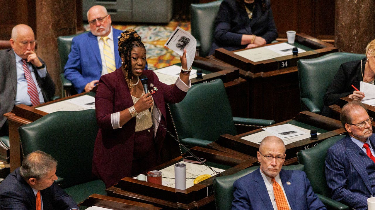 State Senator Charlane Oliver, a Democrat from Nashville, reads from a document describing the Memphis Massacre on the Senate Floor during a special legislative session at the Tennessee State Capitol in Nashville, Tennessee, US, on Wednesday, May 6, 2026.