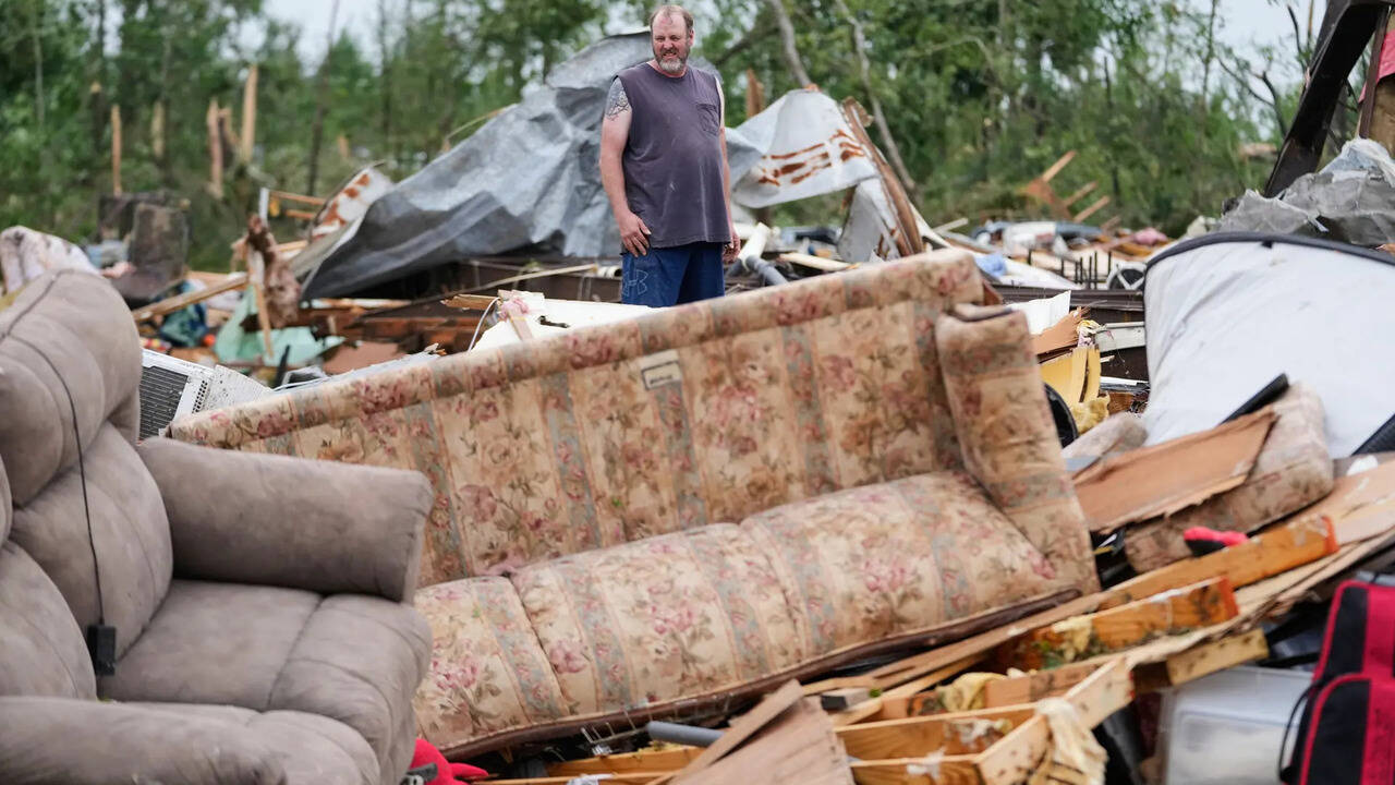Rescue of kitten in tornado-ravaged Mississippi captured by storm chaser